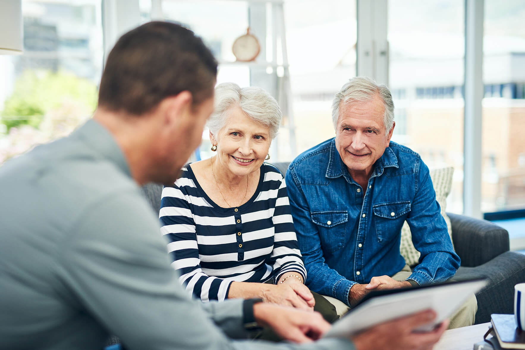 images/insights/2022/mature-couple-smiling-at-an-advisor.jpg